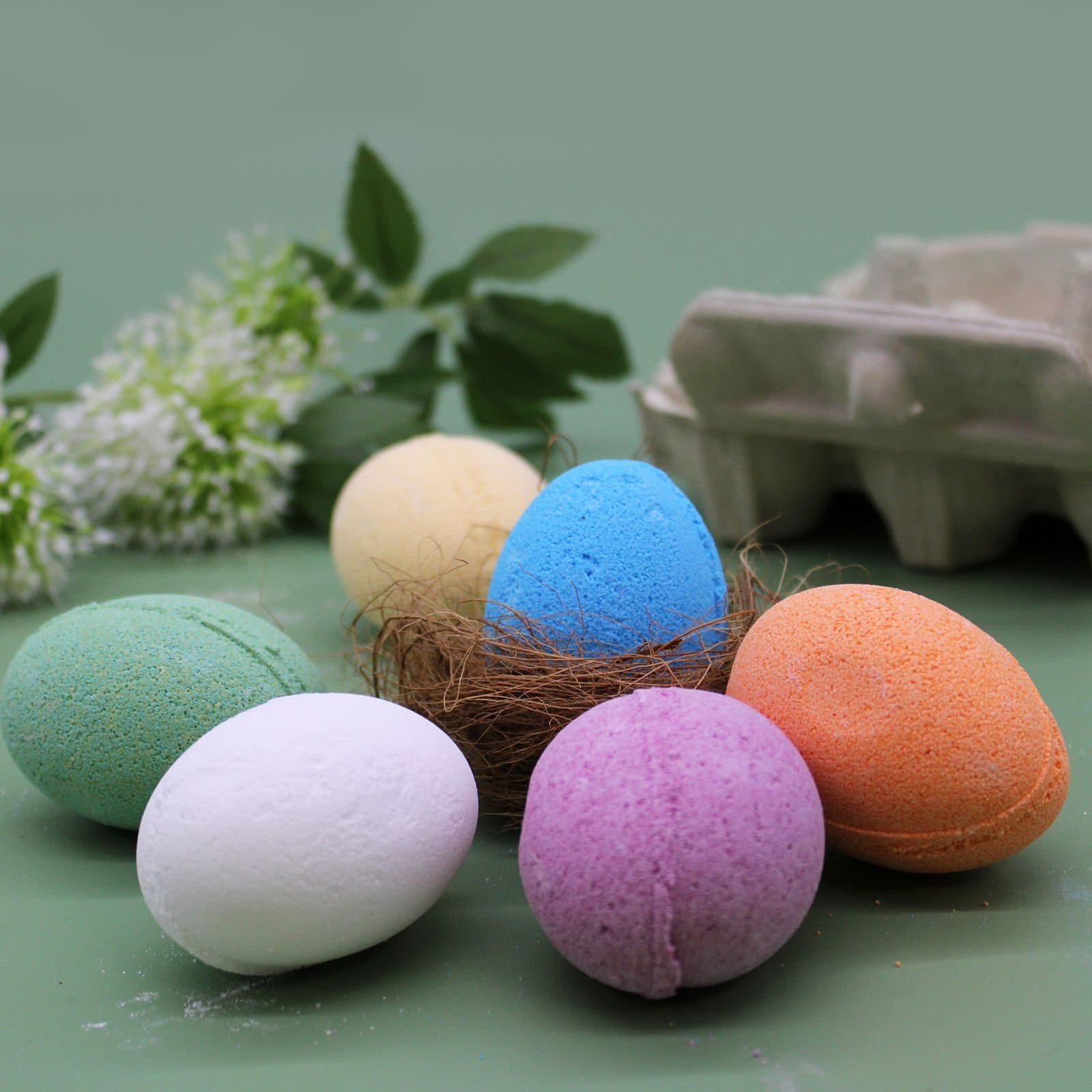 Tray of six colourful egg shaped bath bombs