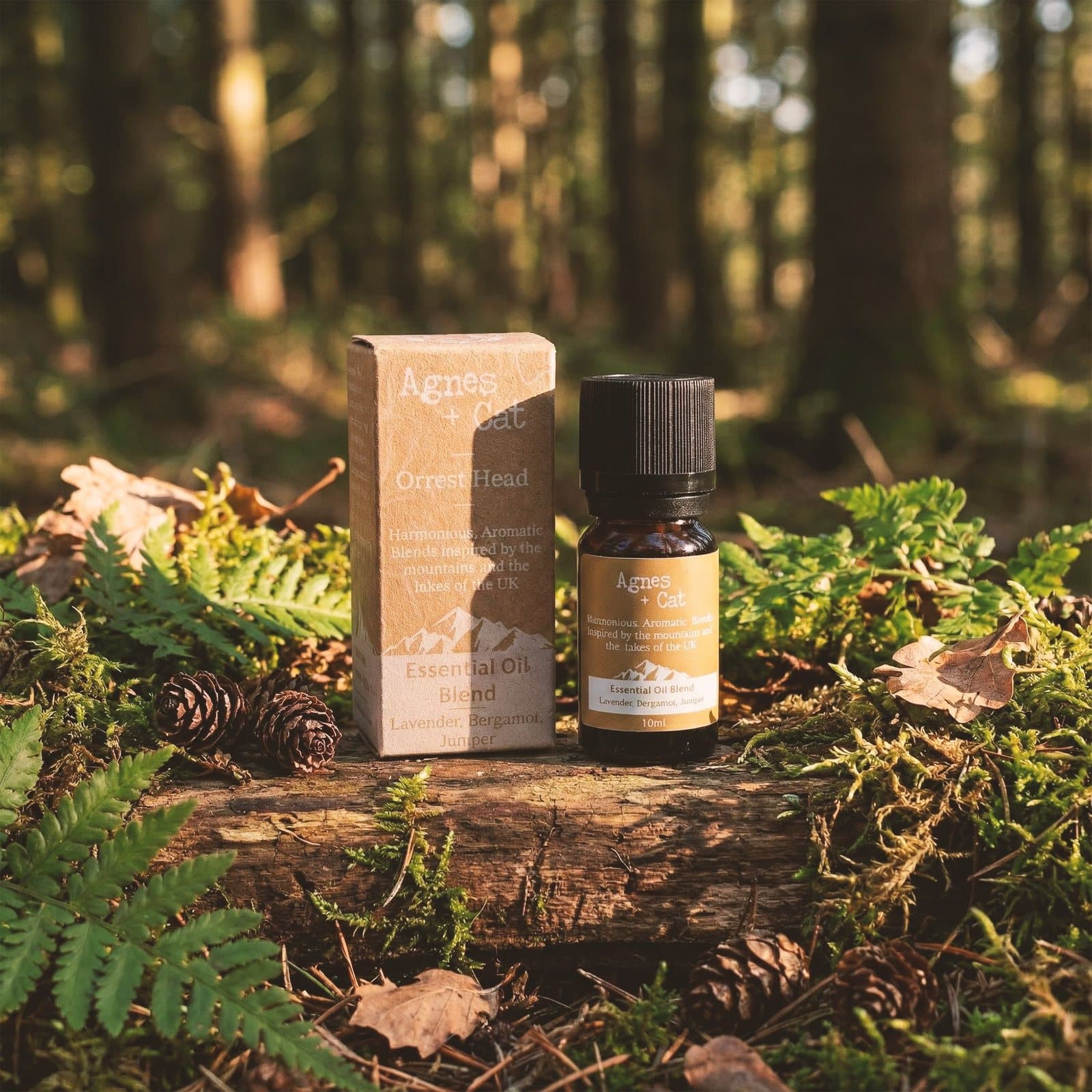 Agnes + Cat essential oil blend in an amber glass bottle with kraft packaging