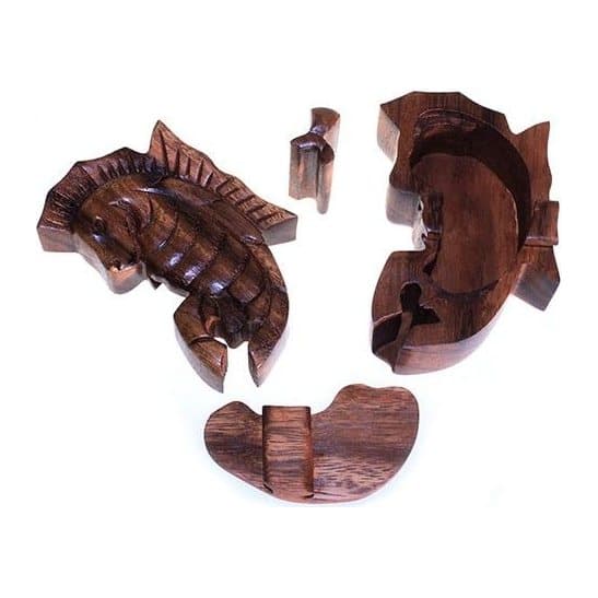 Hand made wooden puzzle box with a sea horse design
