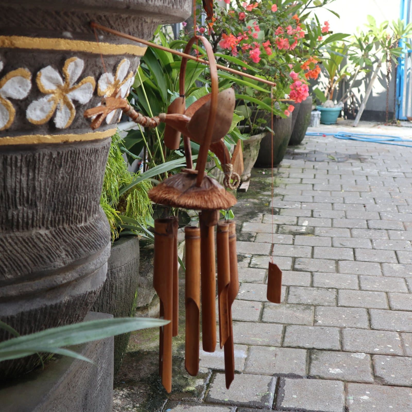Natural finish bamboo wind chime with hanging bamboo tubes