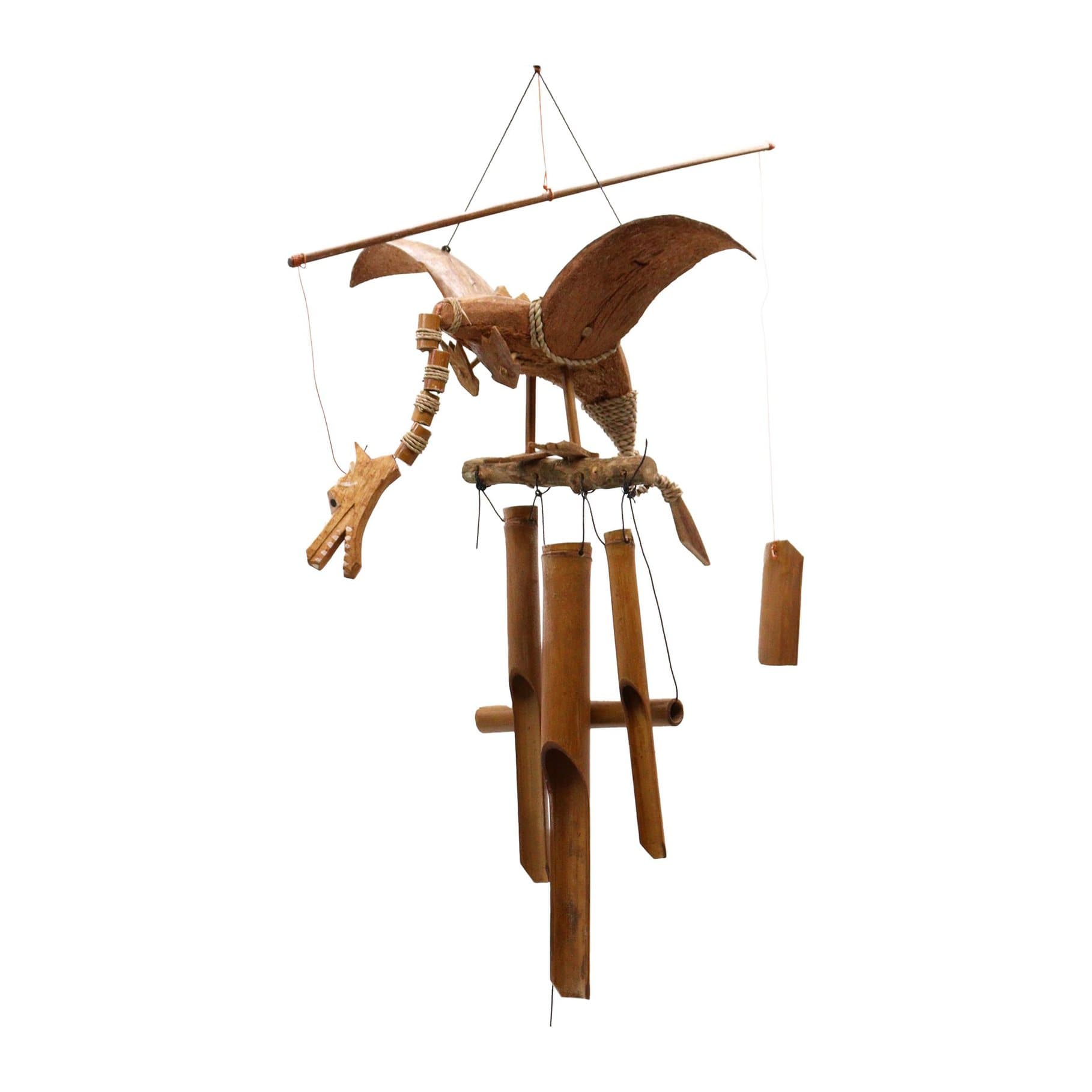 A handmade coconut dragon mobile with spread wings, hanging from a hook