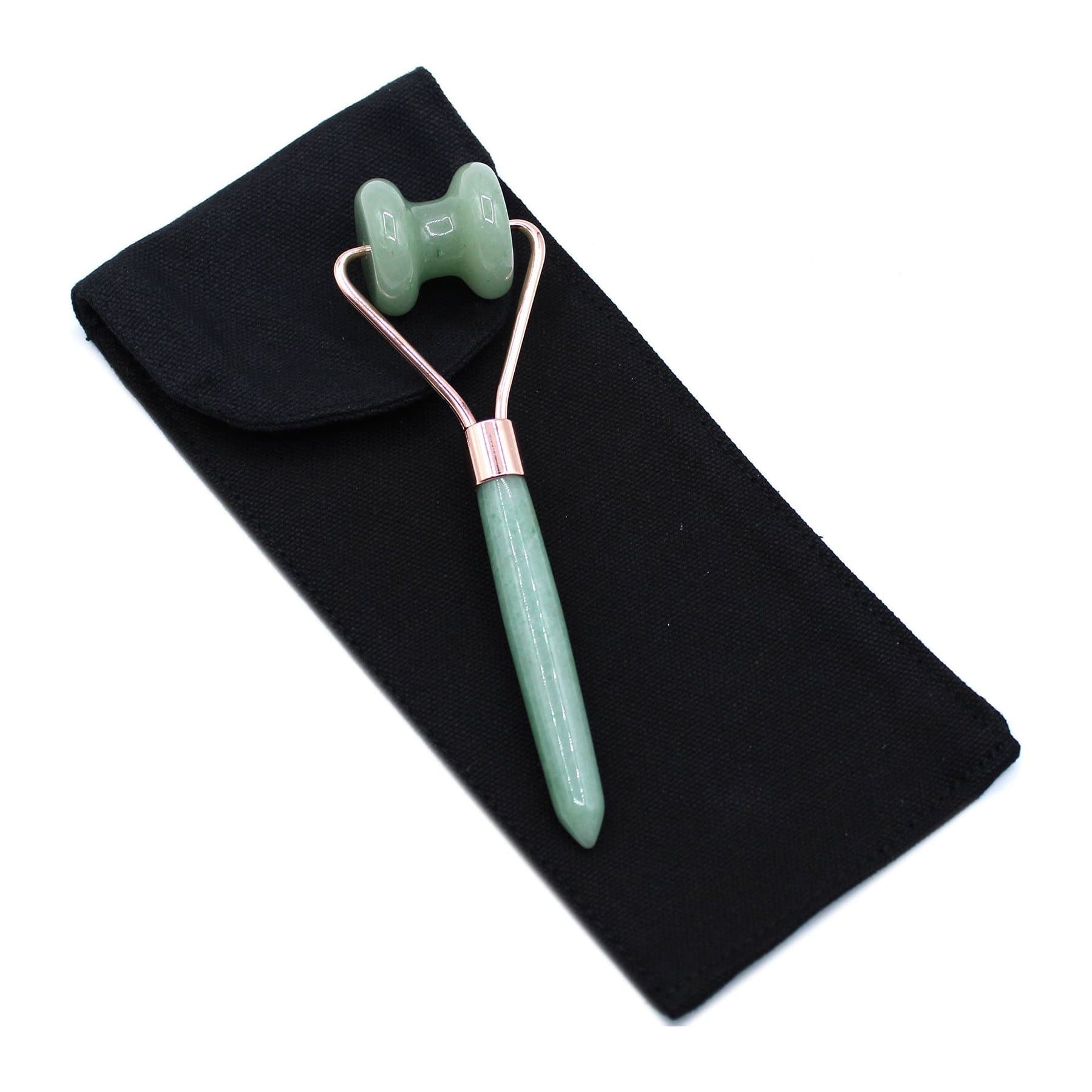 Gemstone jawline roller with a curved polished stone head and slim handle