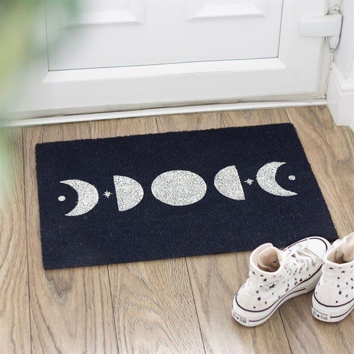 Dark blue coir doormat with the phases of the moon