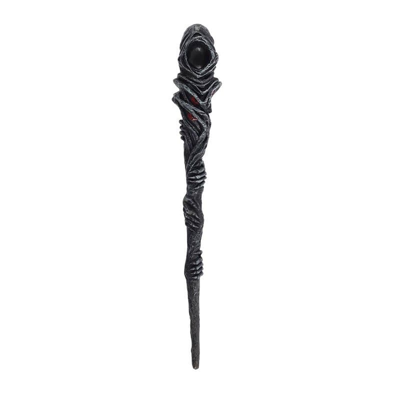 Resin wand with a cloaked grim reaper figure and red eyes