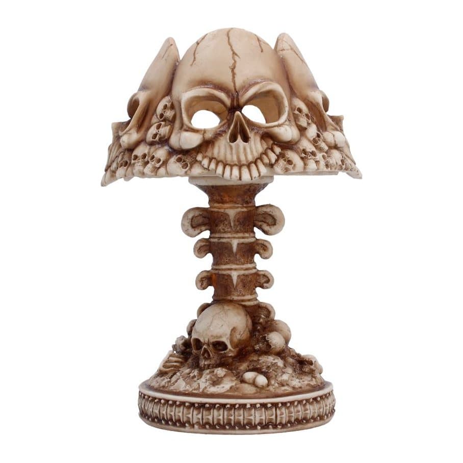 Bone-coloured gothic skull lamp with sculpted skulls on the shade and a base of bones