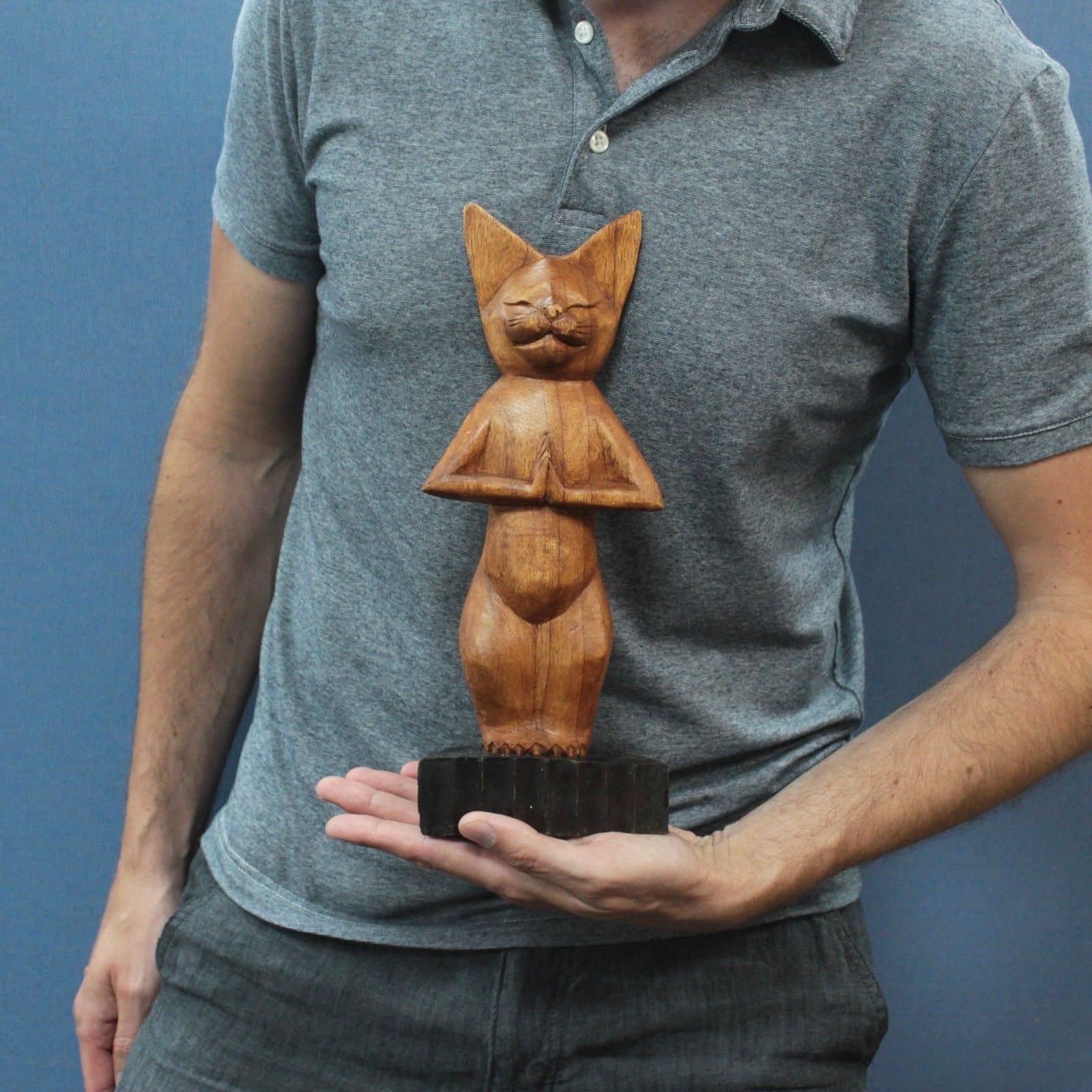 Hand carved wooden yoga cat sculpture