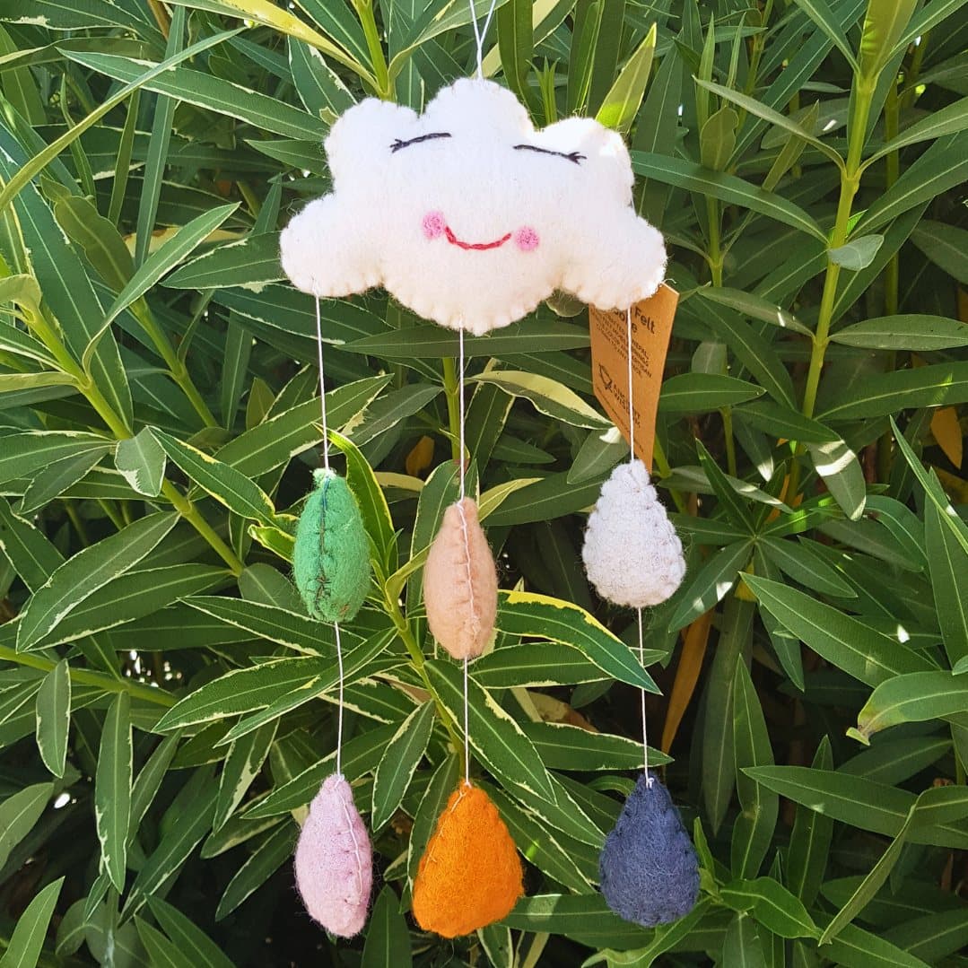 Handmade felt mobile with a white cloud and coloured felt raindrops