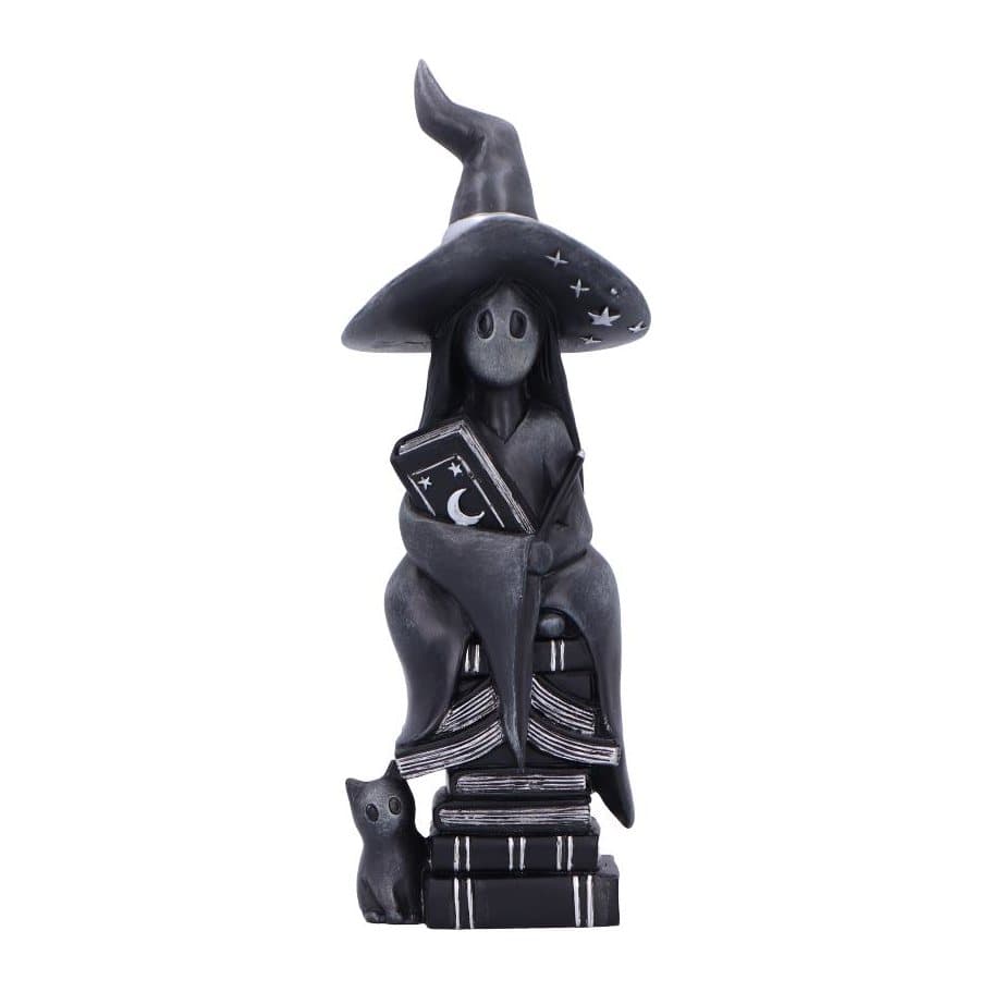 Resin figurine of a tiny soul on spell books with a witch's hat and black cat