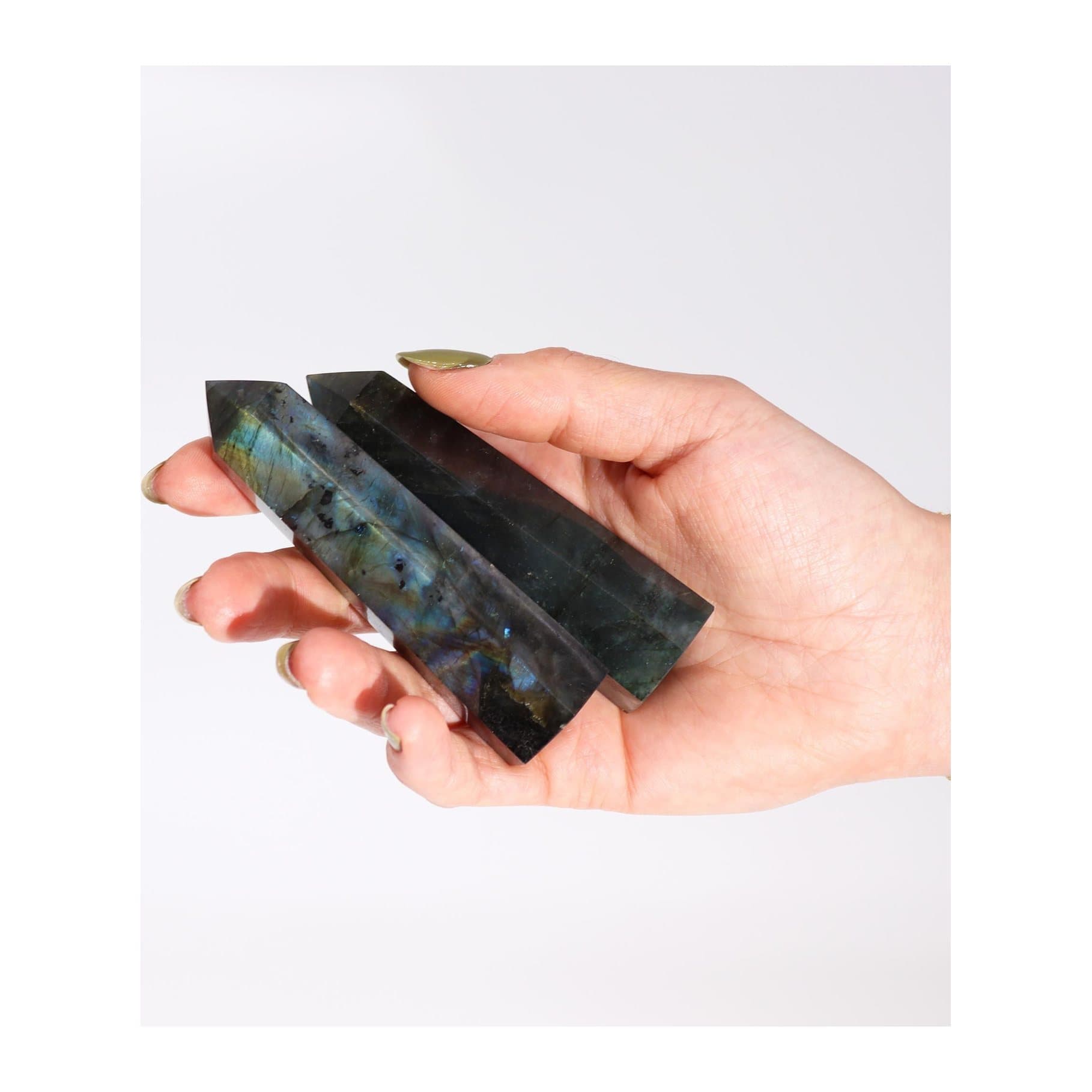Labradorite crystal point with iridescent blue, green and gold flashes