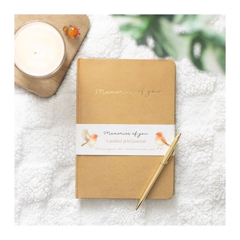 A5 grief journal with soft kraft-style cover and robin illustrations
