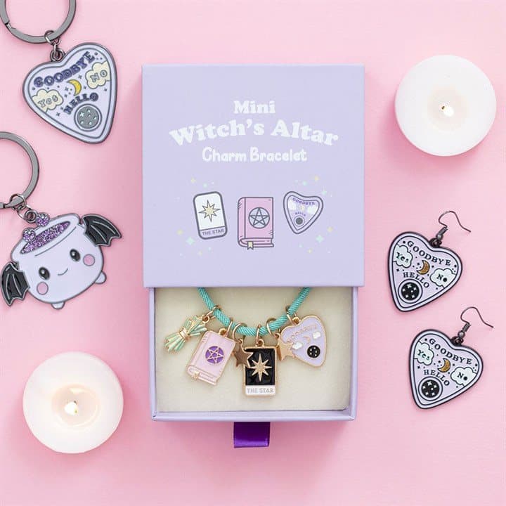 Charm bracelet with small enamel witch's altar icons on a cord