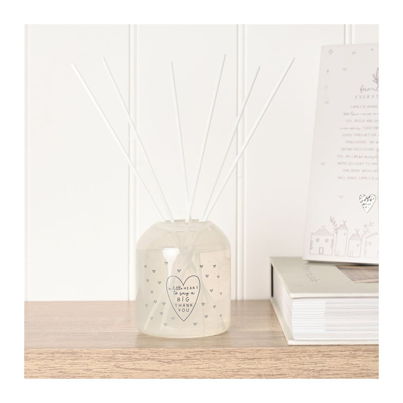 Glass diffuser with a thank you sentiment and floral detailing