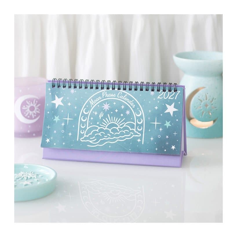 Pastel moon phase desk calendar with a wire-bound top
