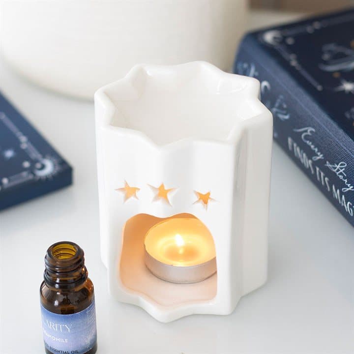 Star-shaped ceramic oil burner in white and in blue