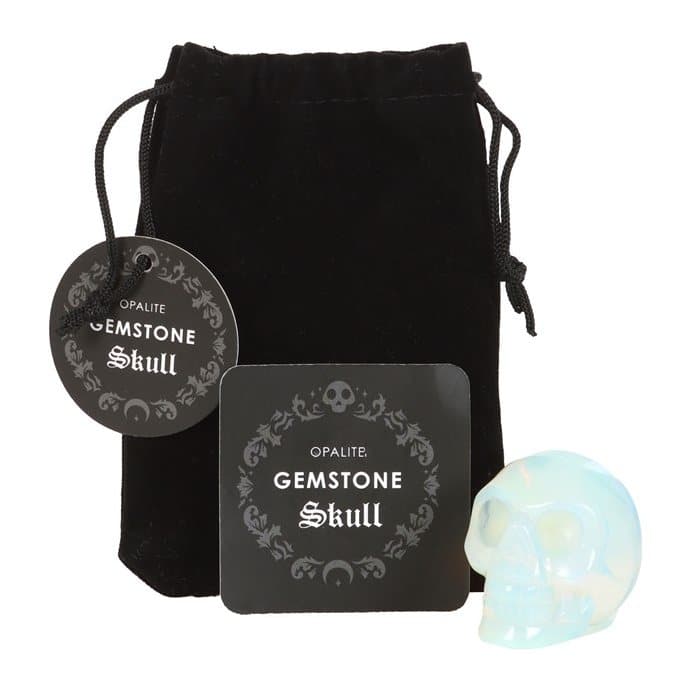 Palm-sized opalite crystal skull with a black drawstring pouch
