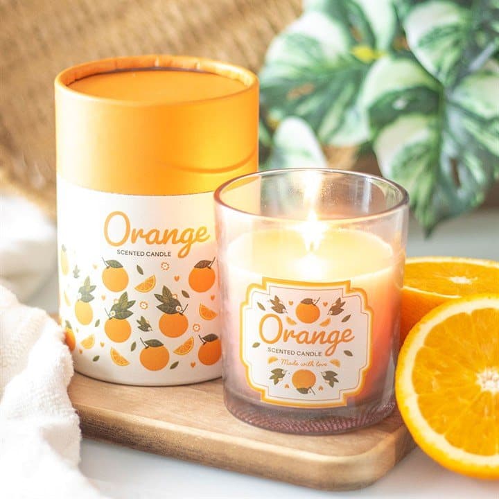 Orange print glass candle holder with a wooden lid