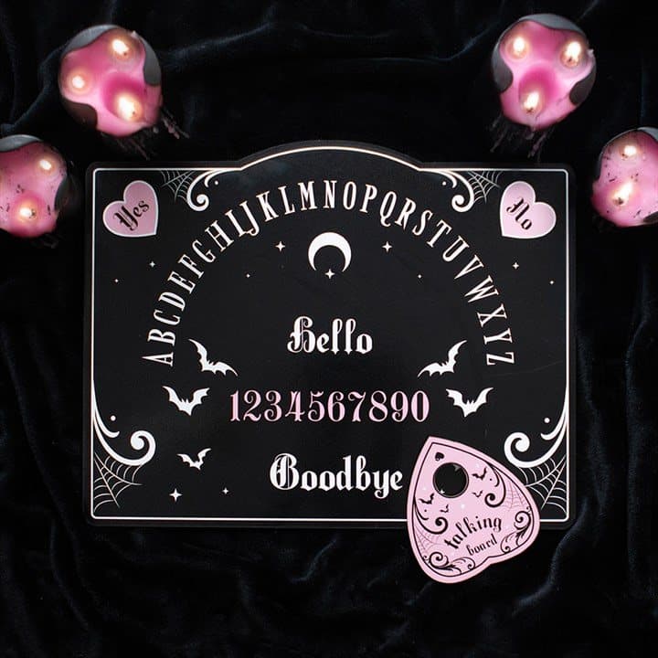 Pink and black cork talking board