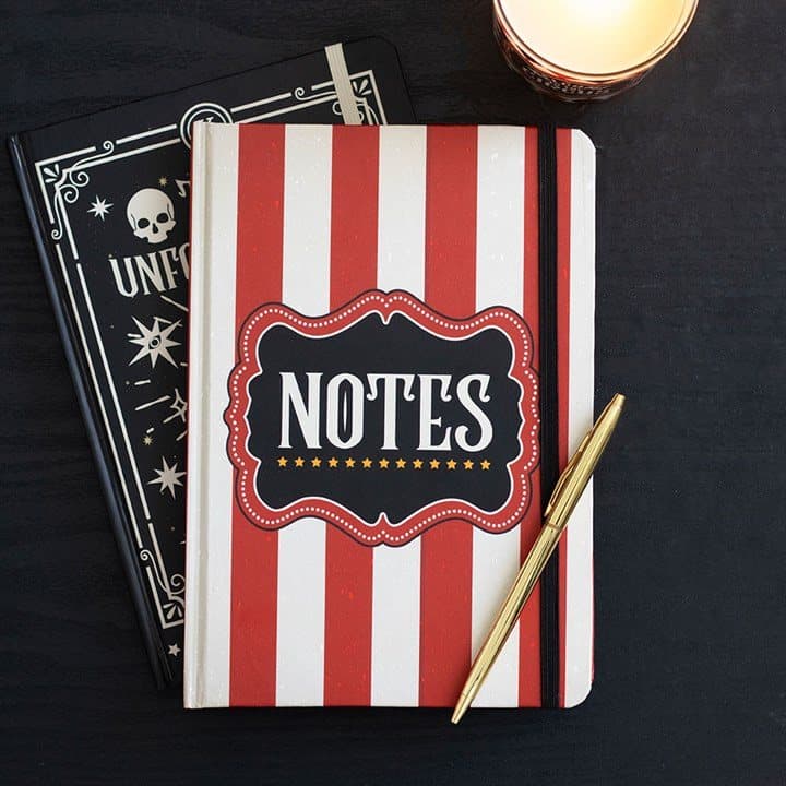 Red striped A5 notebook with a vintage circus-style NOTES label