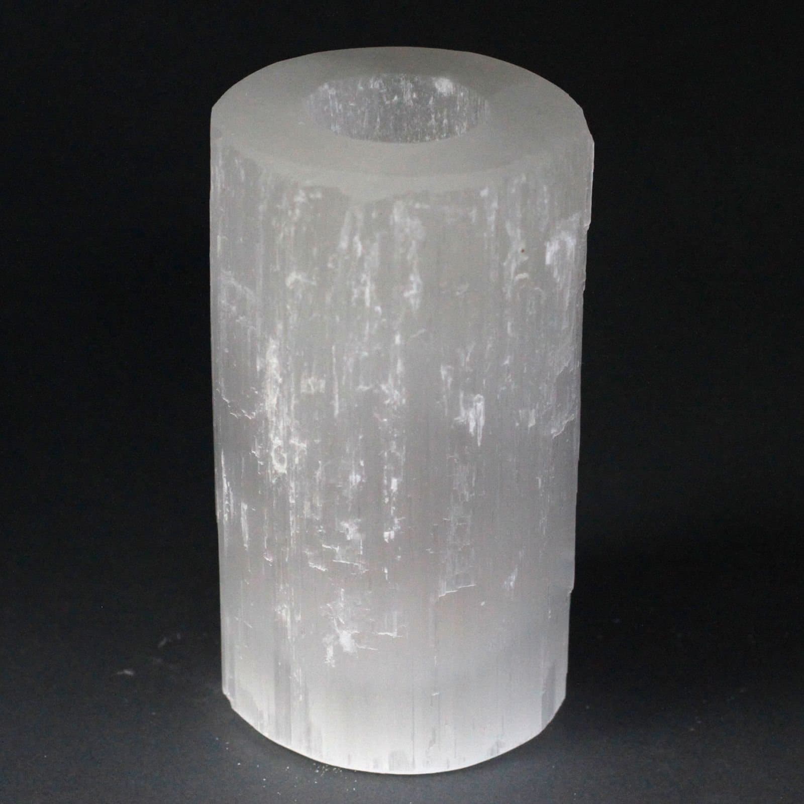 Selenite candle holder in translucent white crystal