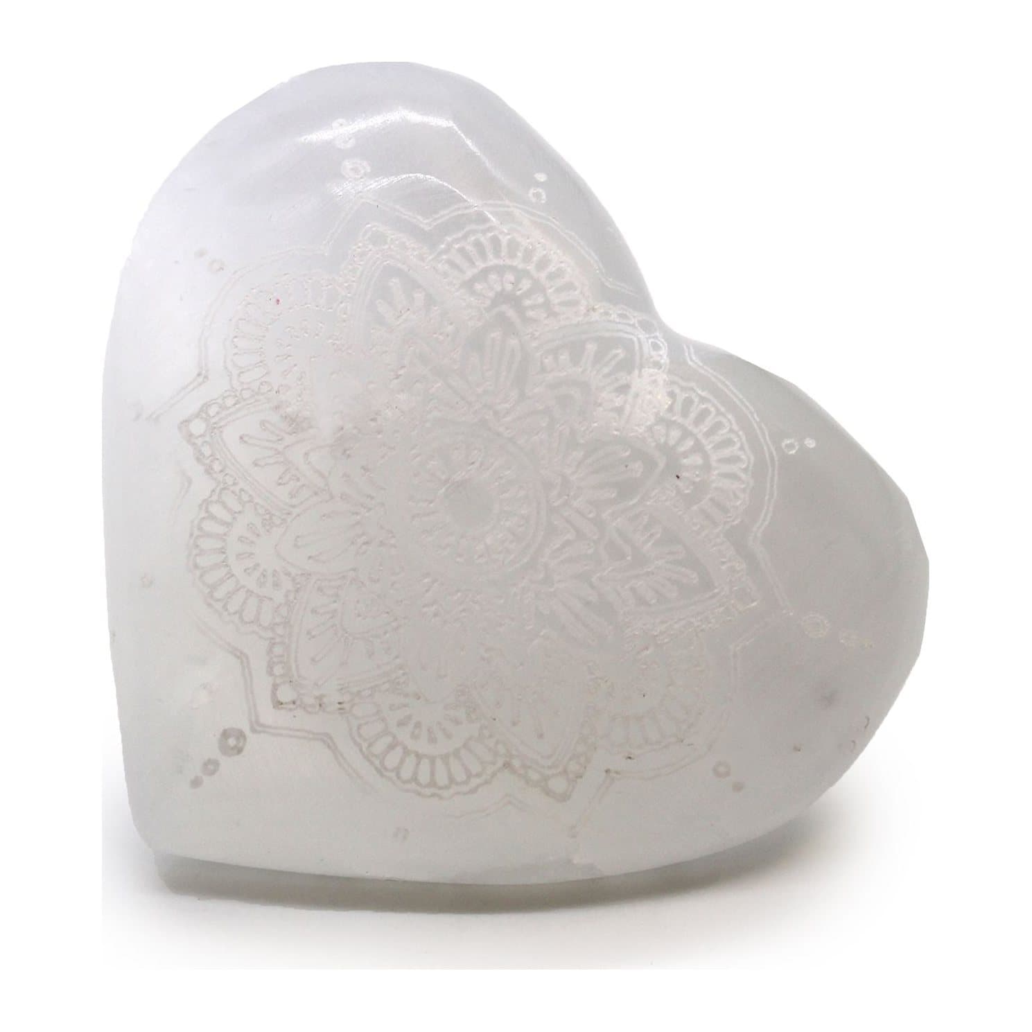 Selenite heart with an engraved mandala design