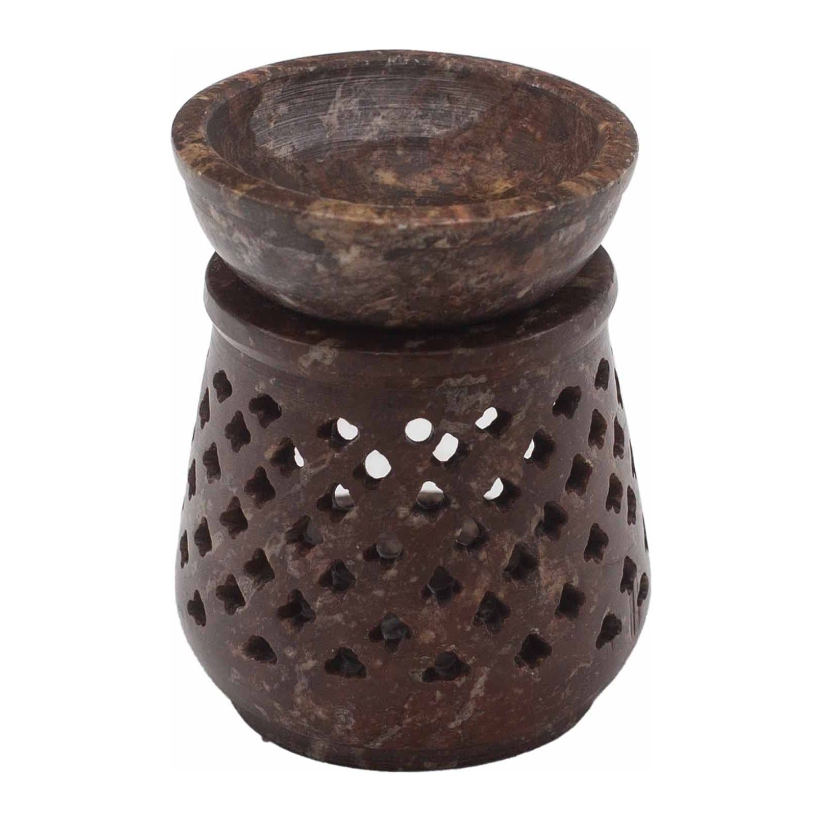 Small carved soapstone oil burner in a classic design