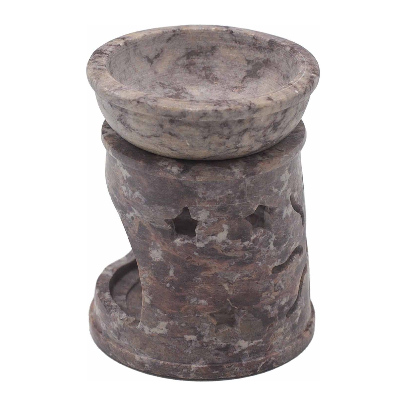 Small soapstone oil burner hand-carved with a sun and stars motif