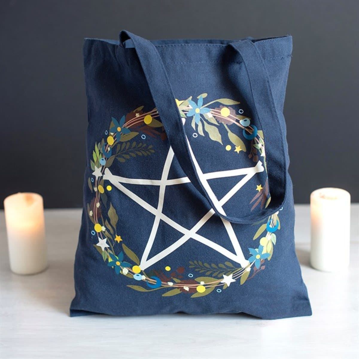 Deep navy tote bag with a pentagram wreath design