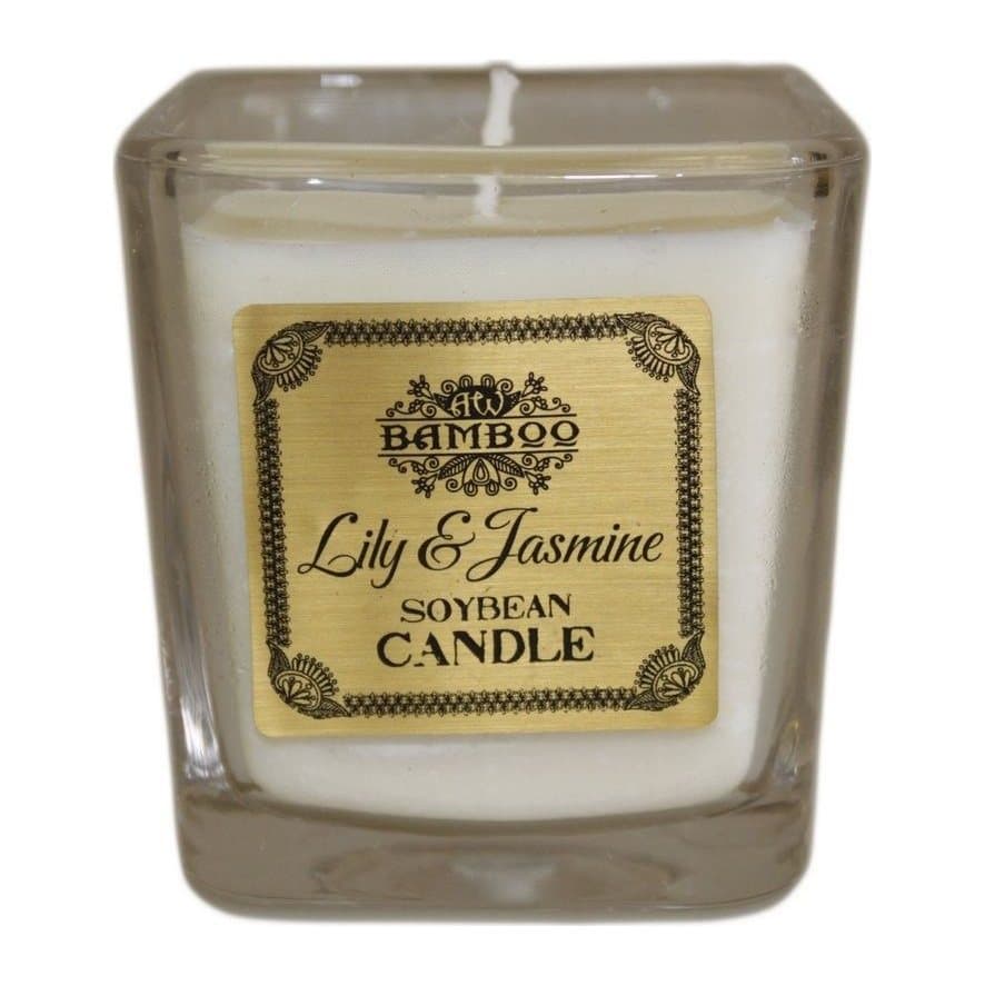 Soy wax candle in a chunky recycled glass jar with dust cover