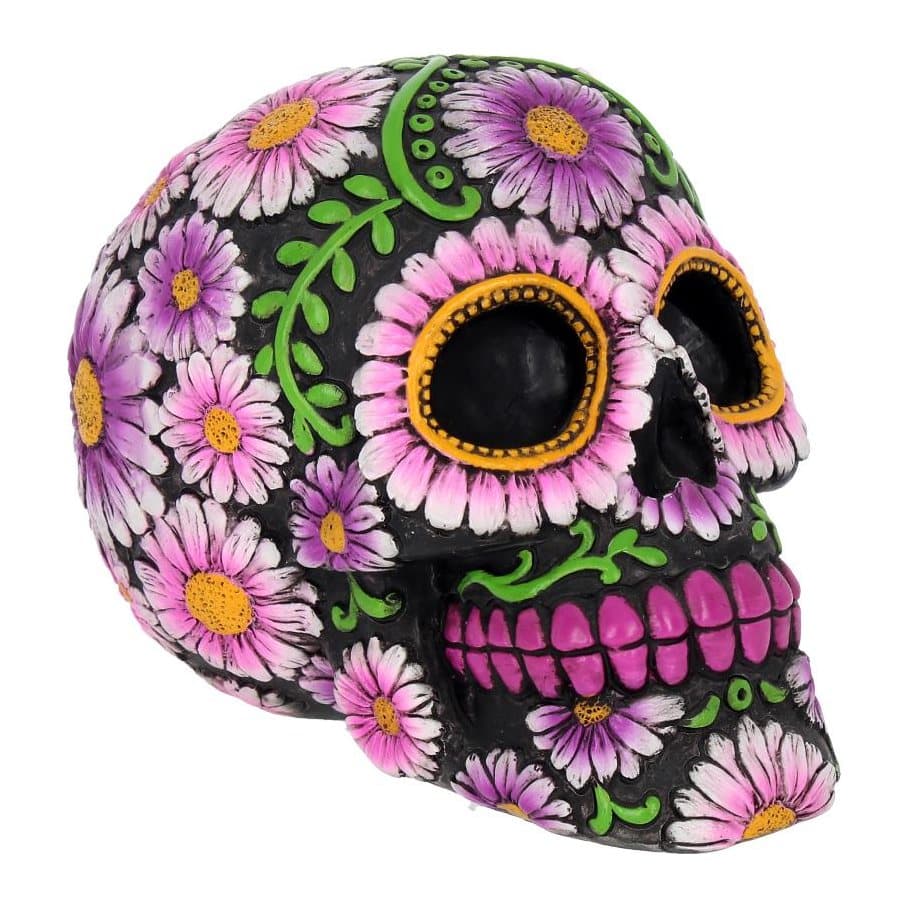 Black resin skull with violet flowers, green vines and yellow eyes