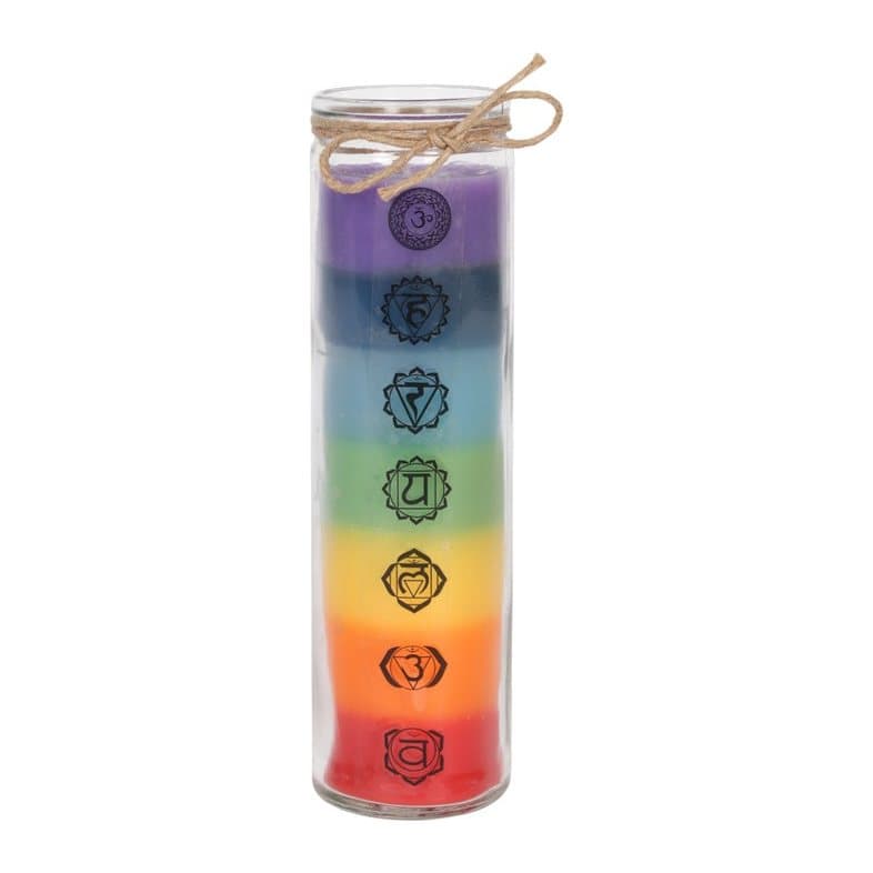 Tall glass chakra candle with seven coloured wax layers