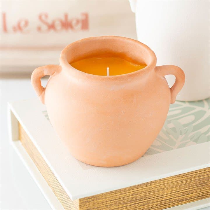 Terracotta urn candle with artisan-style handles
