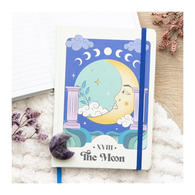 A5 notebook with a colourful celestial design inspired by The Moon tarot card