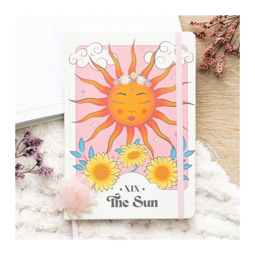 A5 notebook with a colourful design inspired by The Sun tarot cards