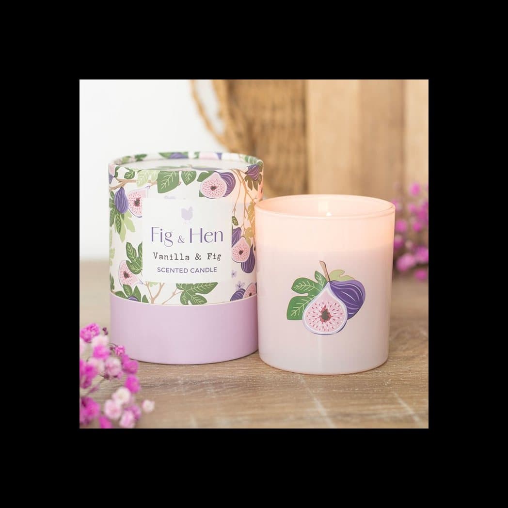 Soft pink glass jar candle with a fig illustration
