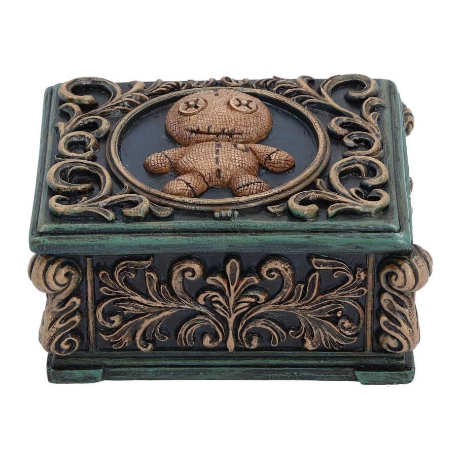 Dark blue and green resin trinket box with a voodoo doll on the lid