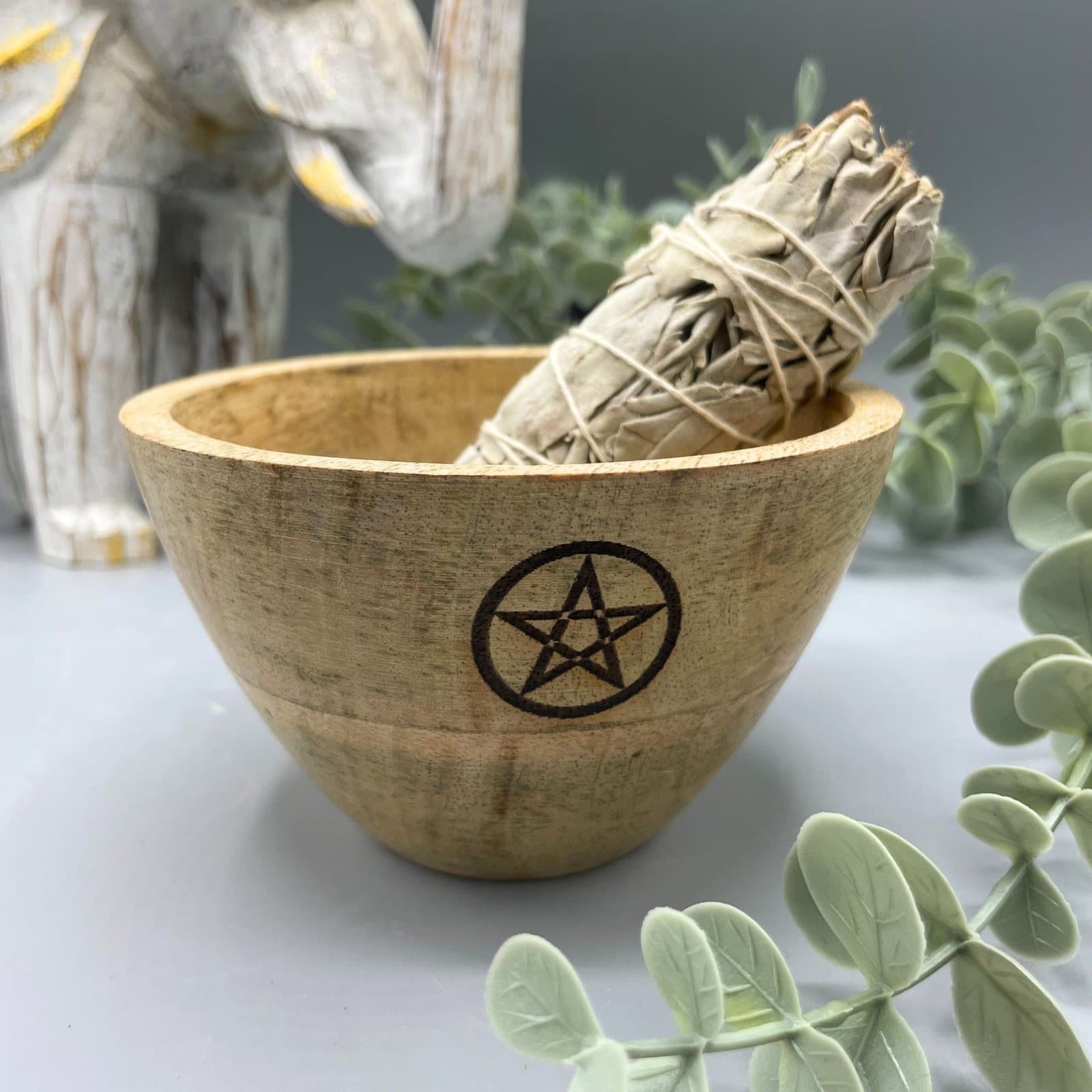 Wooden offerings bowl with a pentagram design