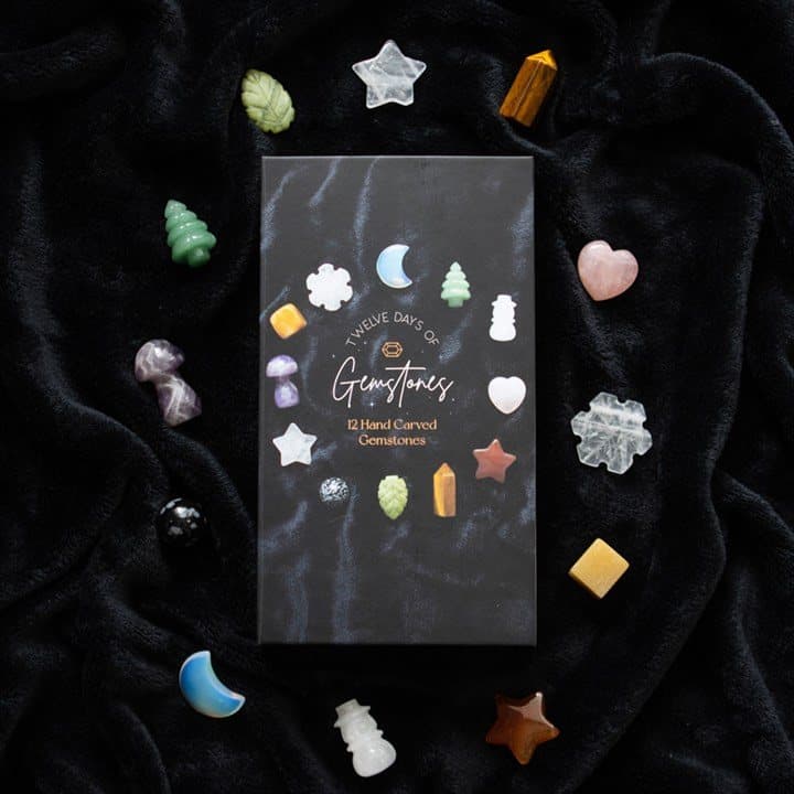 Crystal advent calendar picture box with 12 carved gemstones in festive shapes