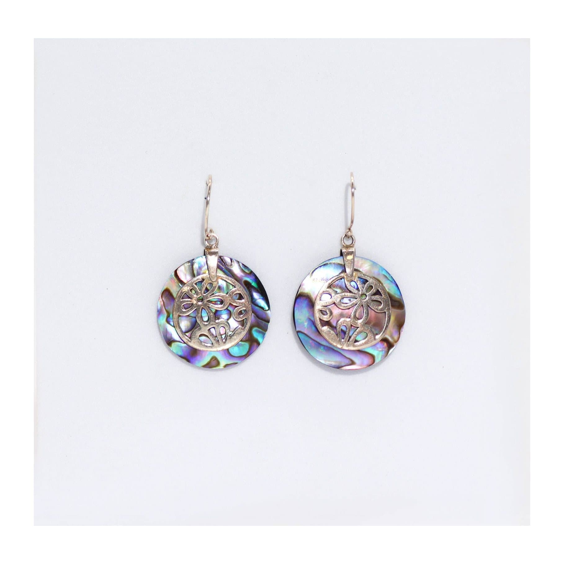 Silver earrings with abalone shell in a flower design