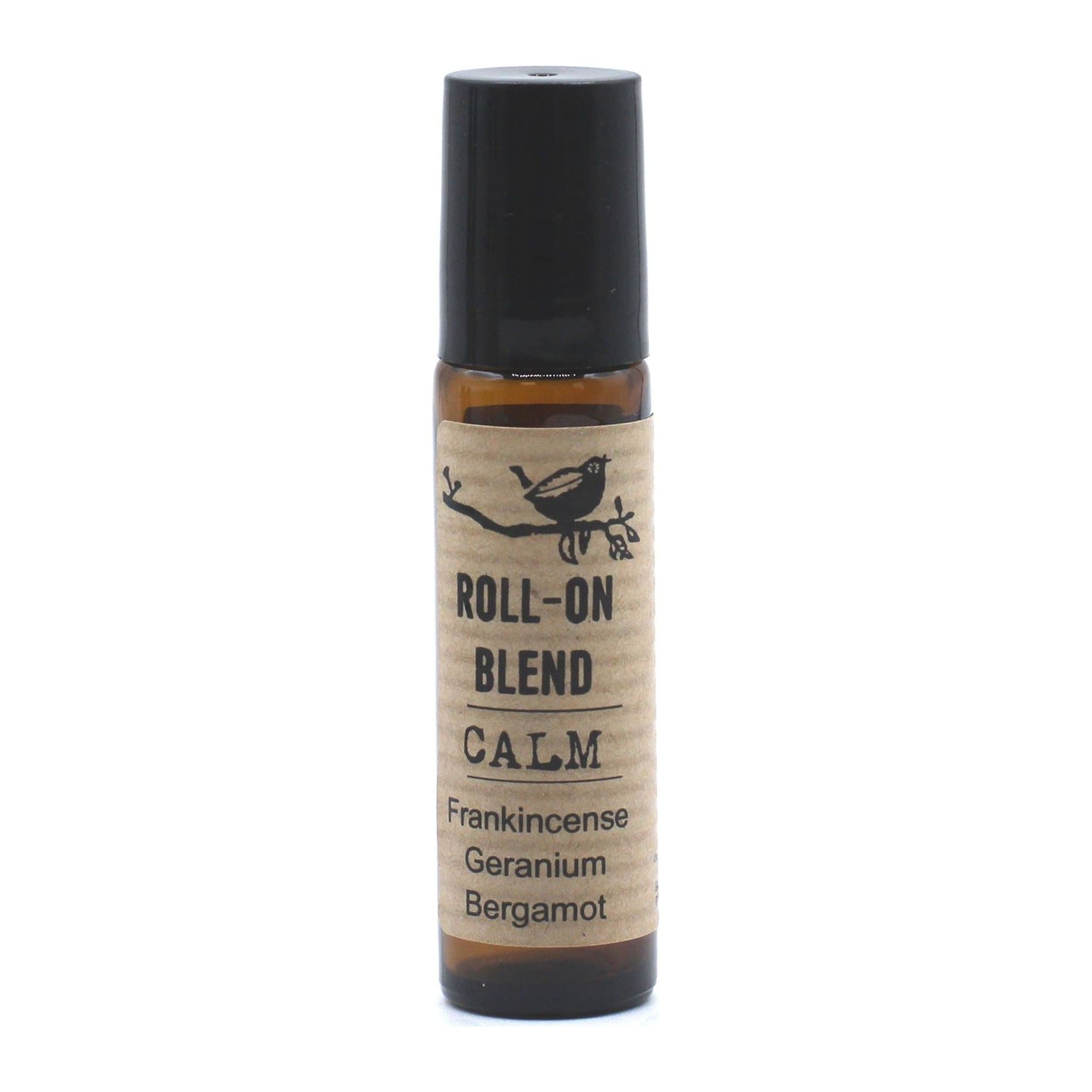 Agnes + Cat essential oil roll-on bottle beside its kraft box