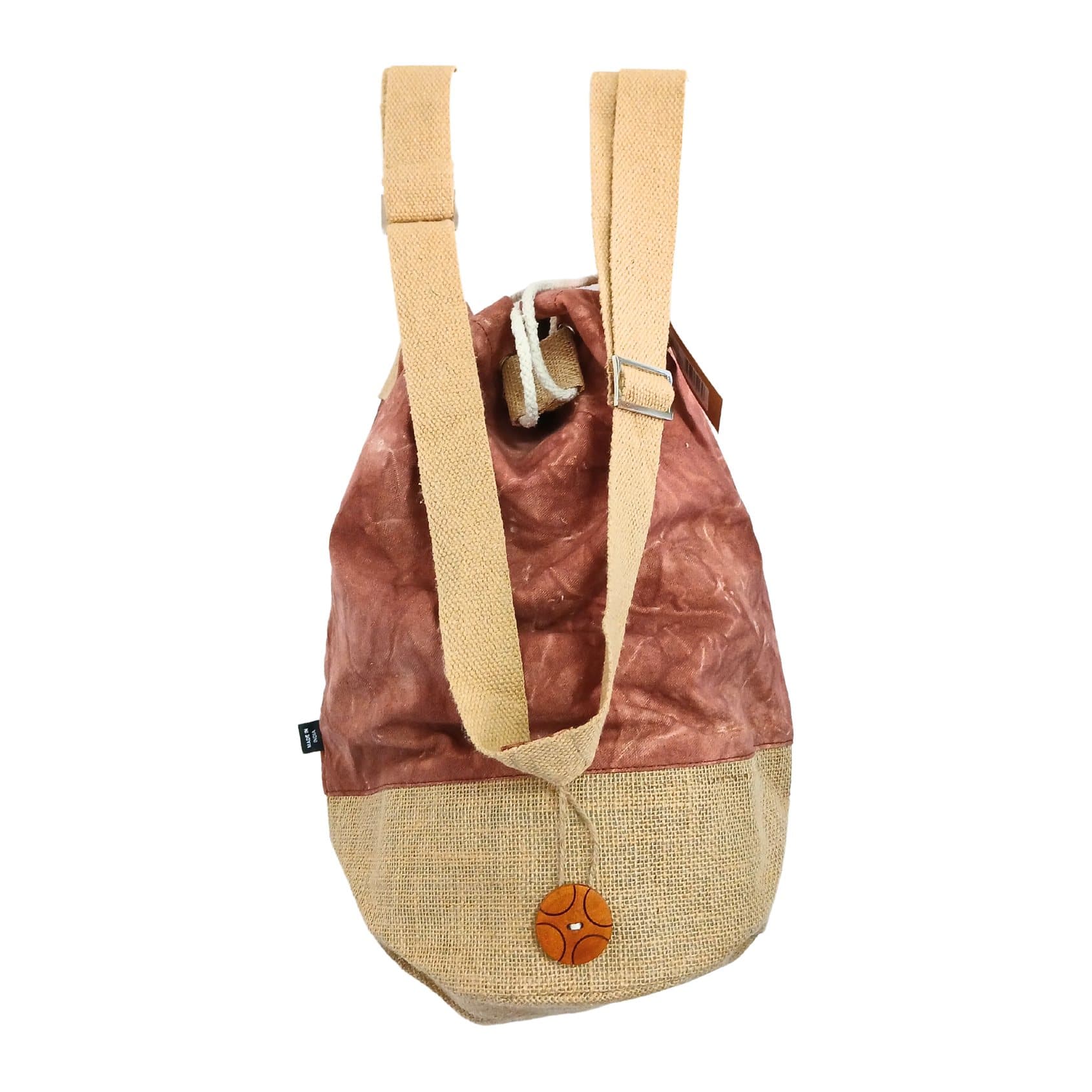 Terracotta stonewash cotton canvas backpack with a hamsa hand on the front
