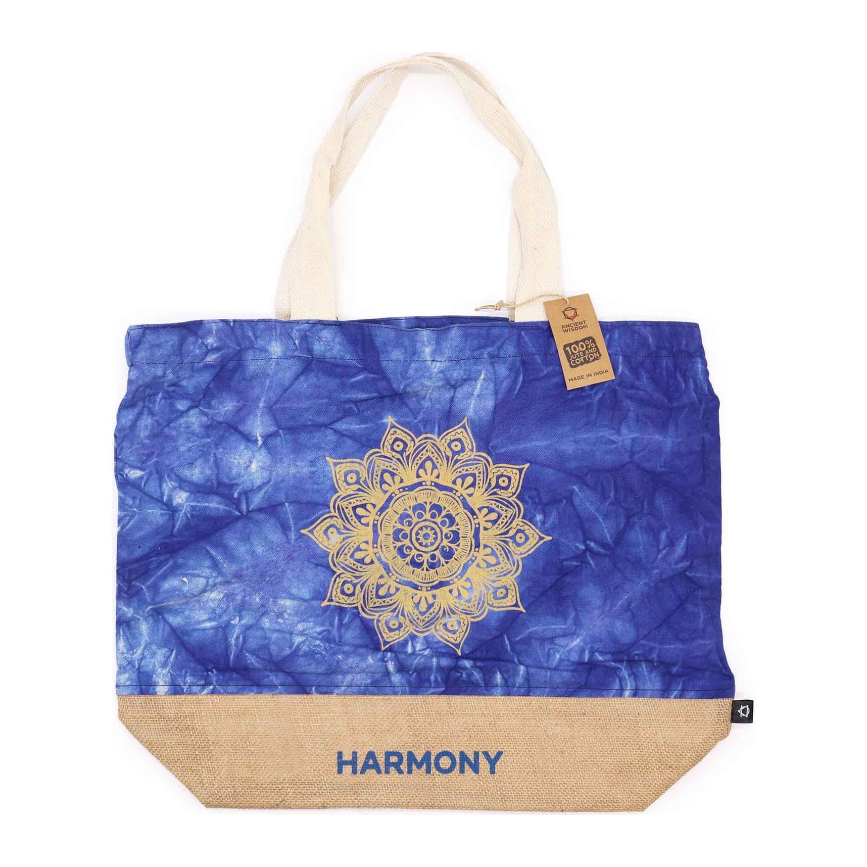 Blue stonewash jute tote bag with a Mandala and the word Harmony on the front