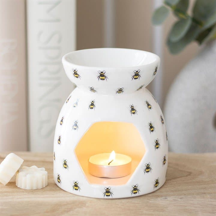 Ceramic oil burner with an all over bee print