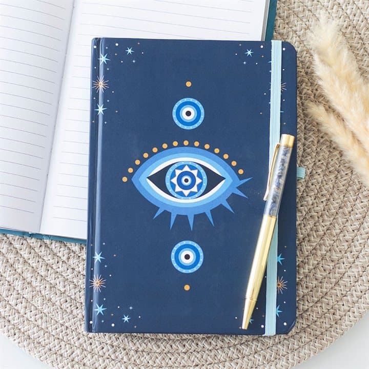 Dark blue A5 all seeing eye notebook with stars and a gold-tone crystal chip pen