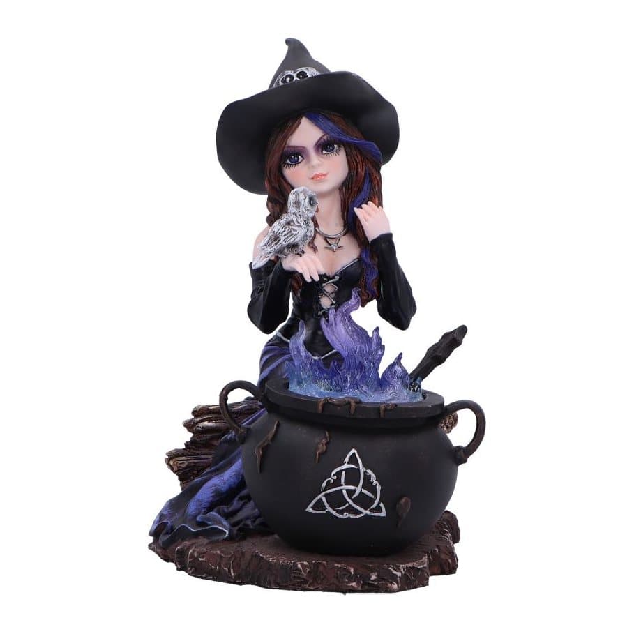 Seated witch figurine in a blue gown with an owl and a black cauldron on a log