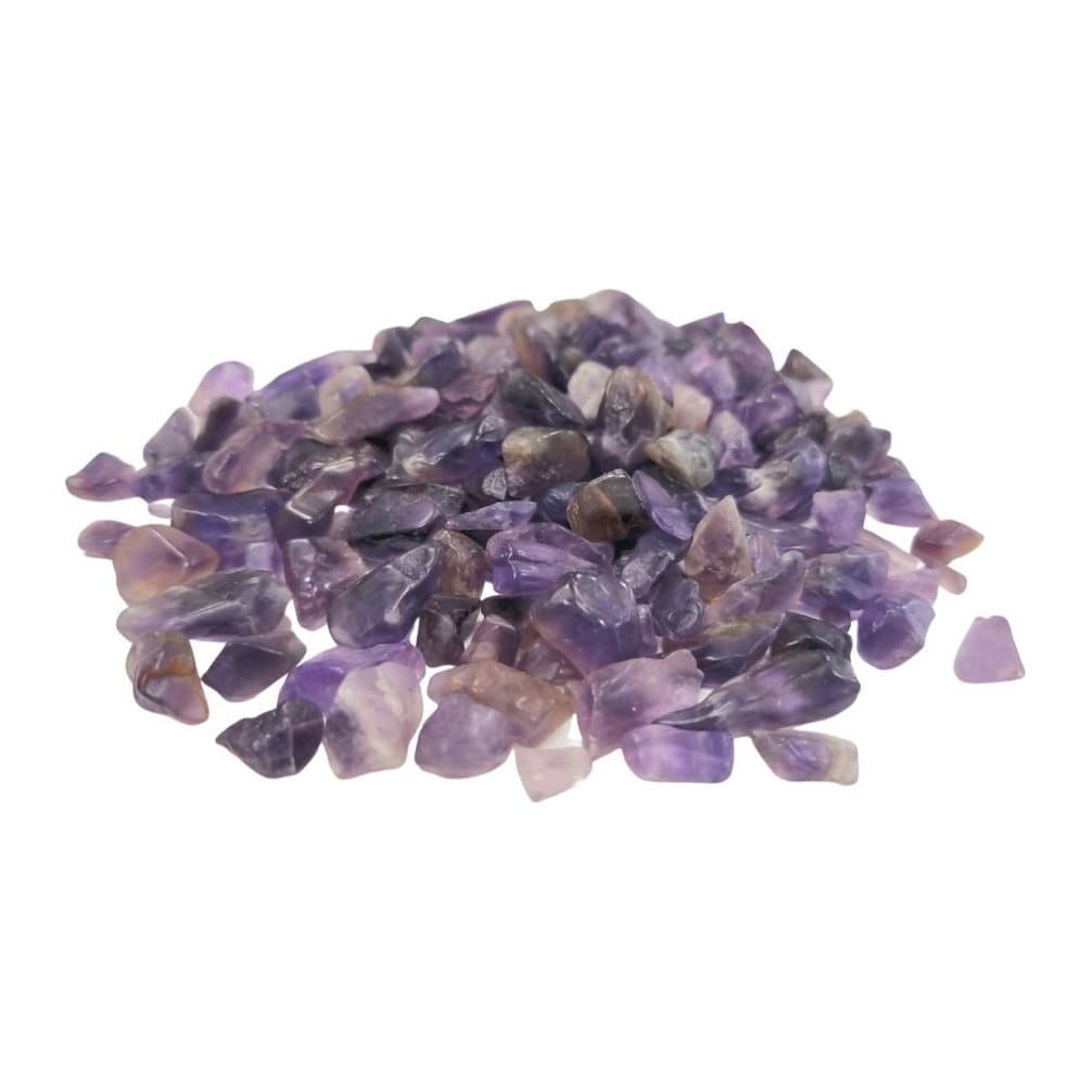 A pile of small purple amethyst gemstone chips