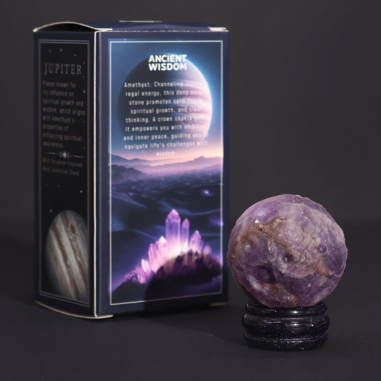 Deep purple amethyst planet sphere on a goldstone stand