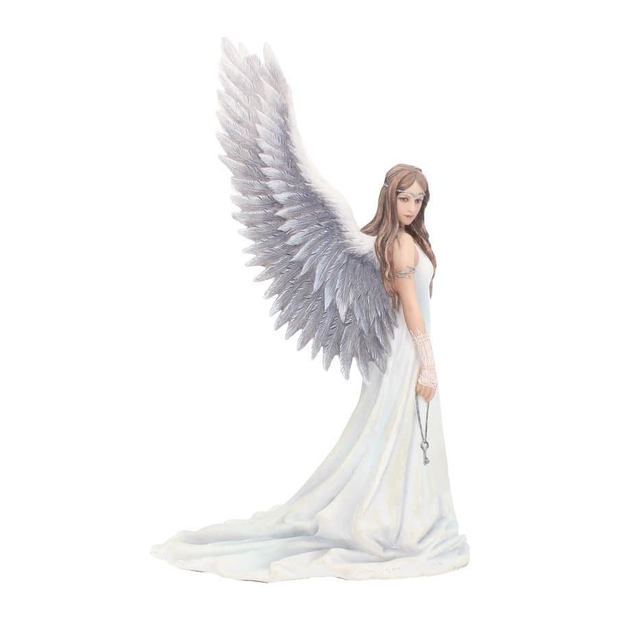 Chestnut-haired angel figurine with white wings holding an iron key on a chain