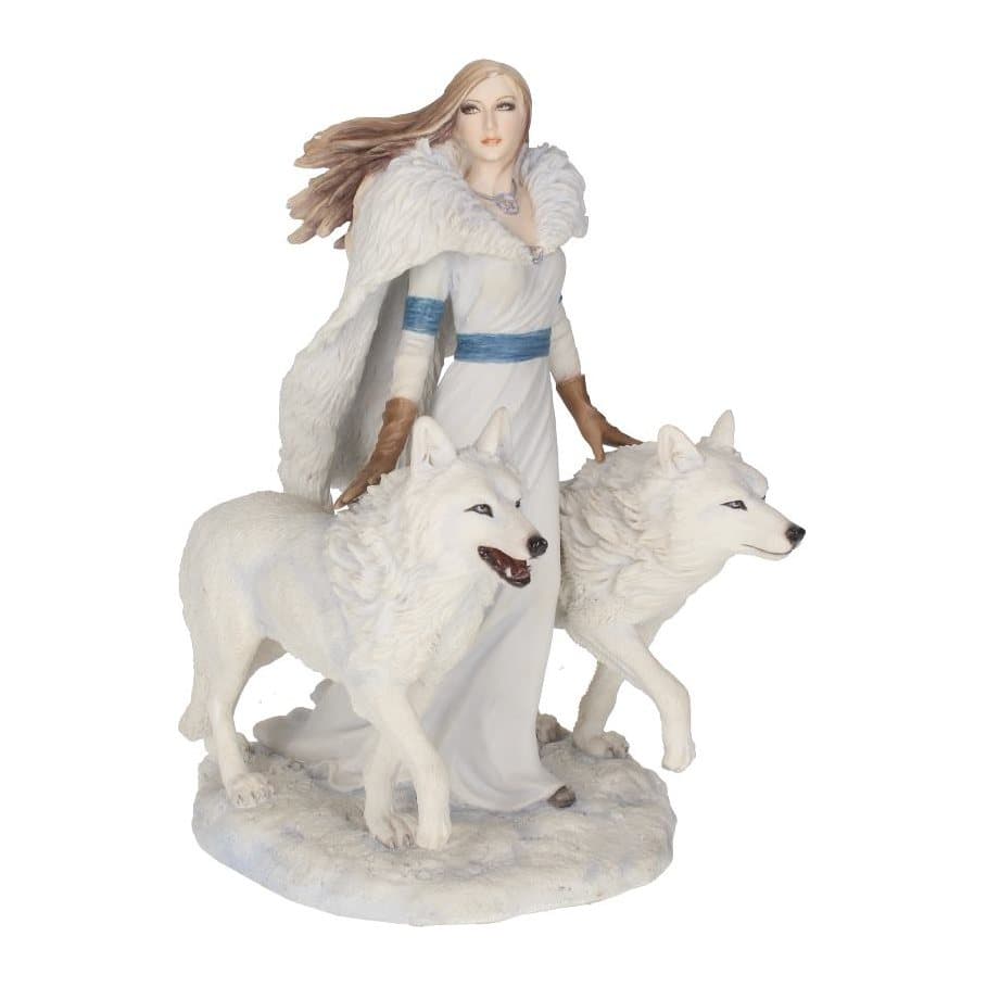 Resin figurine of a woman in white with a white wolf at each side