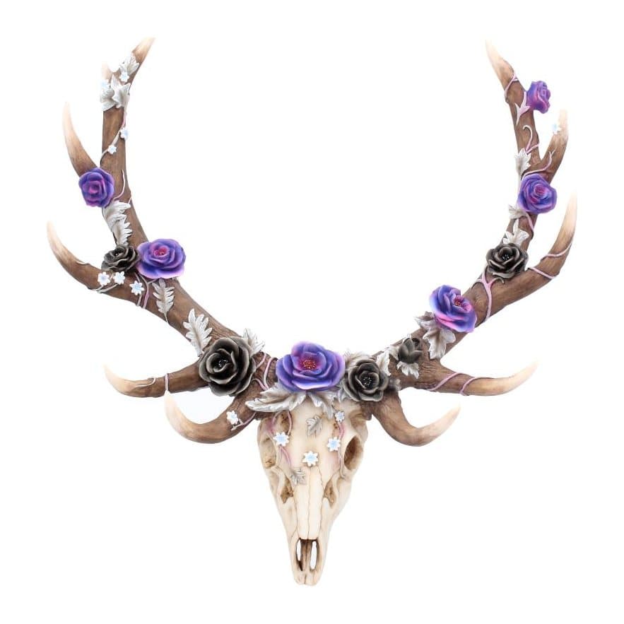 Stag skull with large antlers covered in white vines and purple flowers