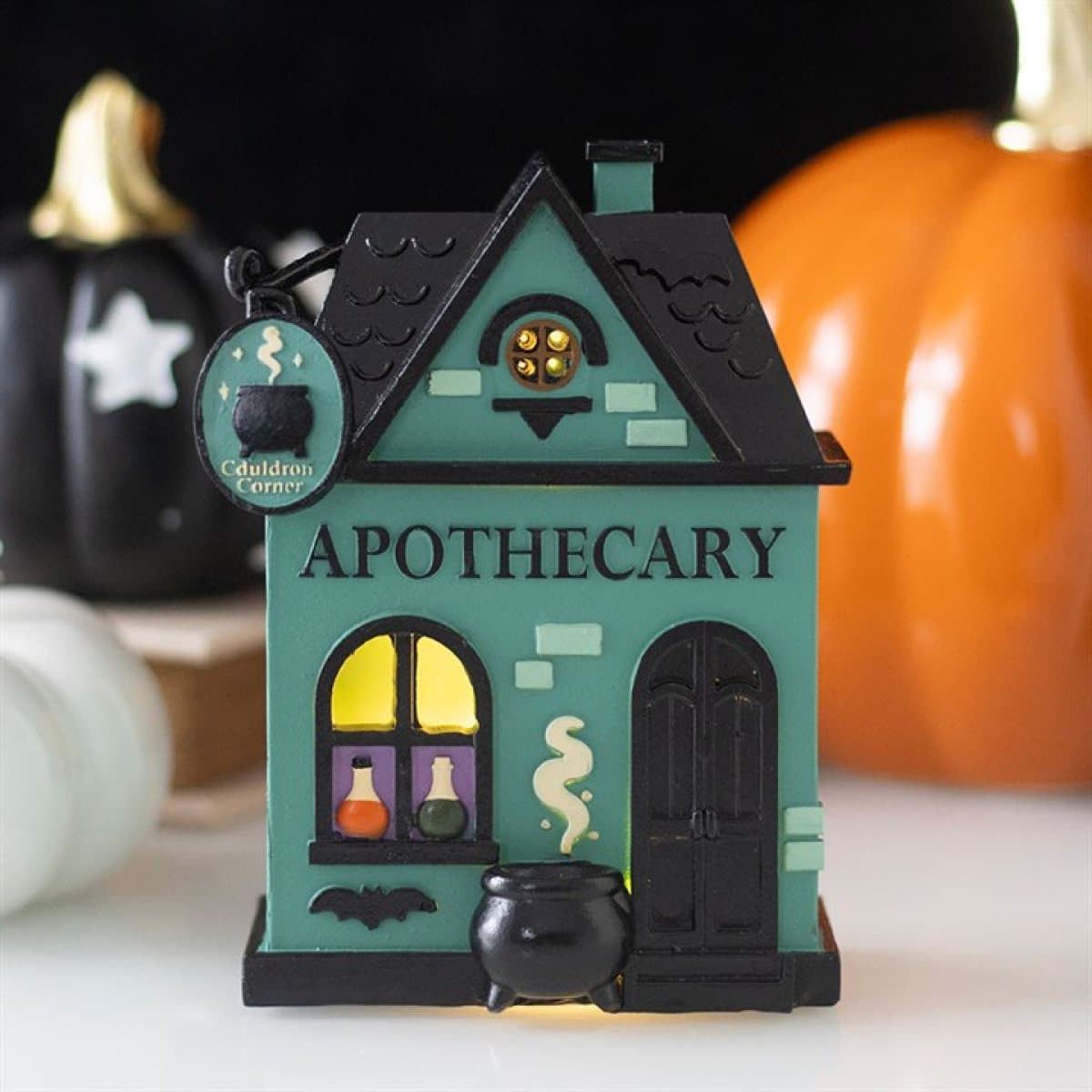 Resin Halloween apothecary shop with glowing LED-lit windows